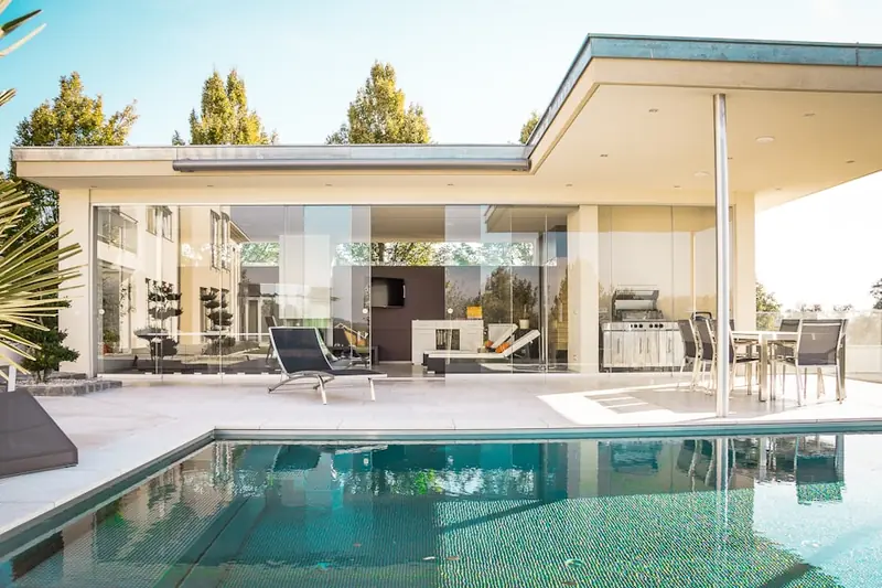 Real estate agent showing a home to clients