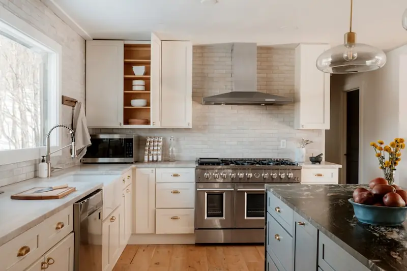 Newly renovated modern kitchen representing the rehab phase of a BRRRR investment